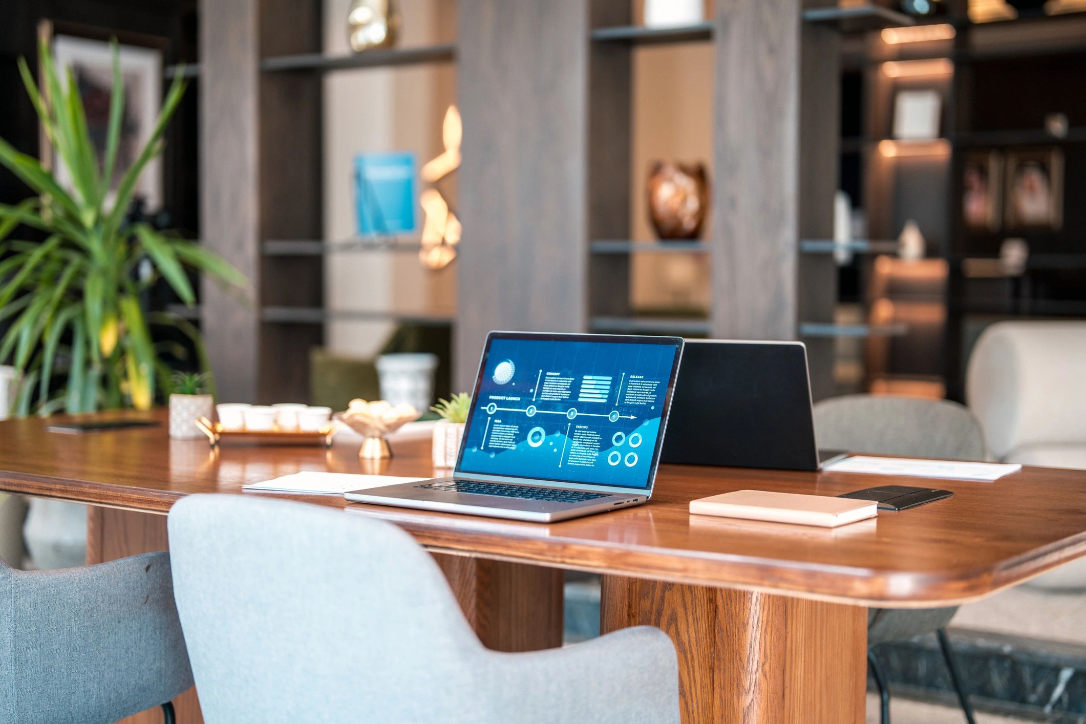 Laptop showing analytics and data visualization in a professional workspace
