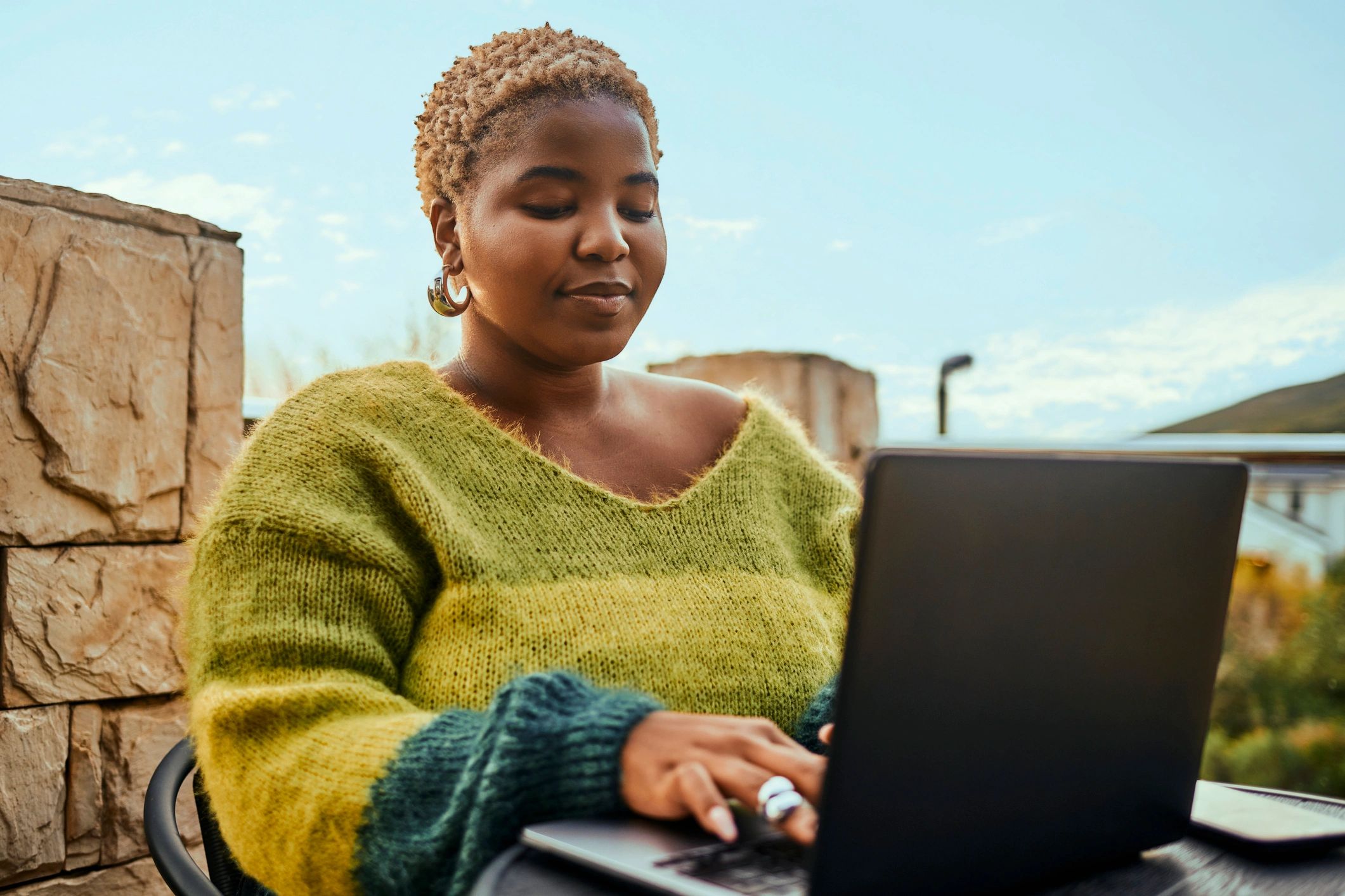 Student practicing interview answers on a laptop